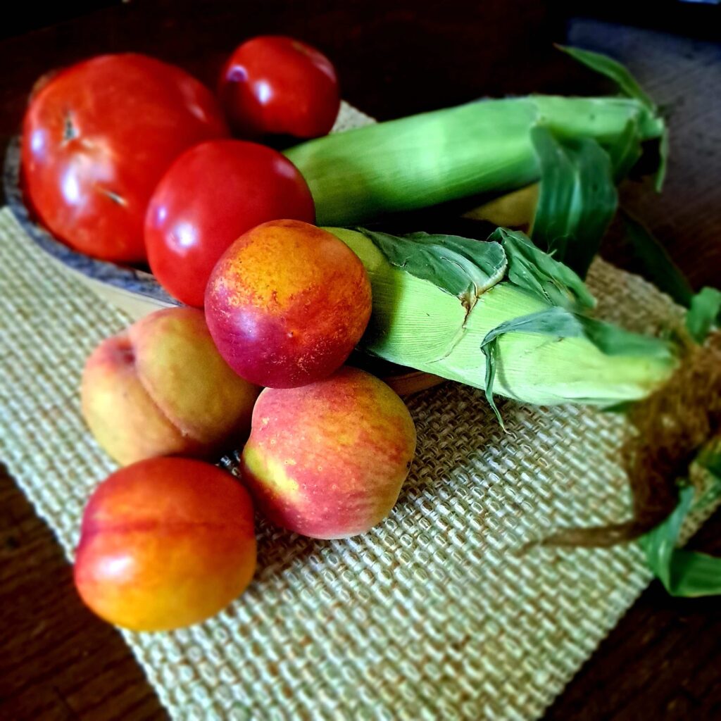 Image of Peaches, tomatoes and corn on the cob from New Jersey Farmers' market