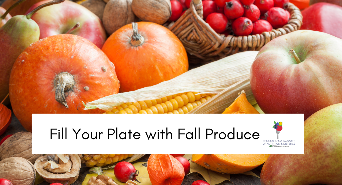 Image of fall produce, apples, cranberries, pumpkins and corn. Fill your plate with fall produce